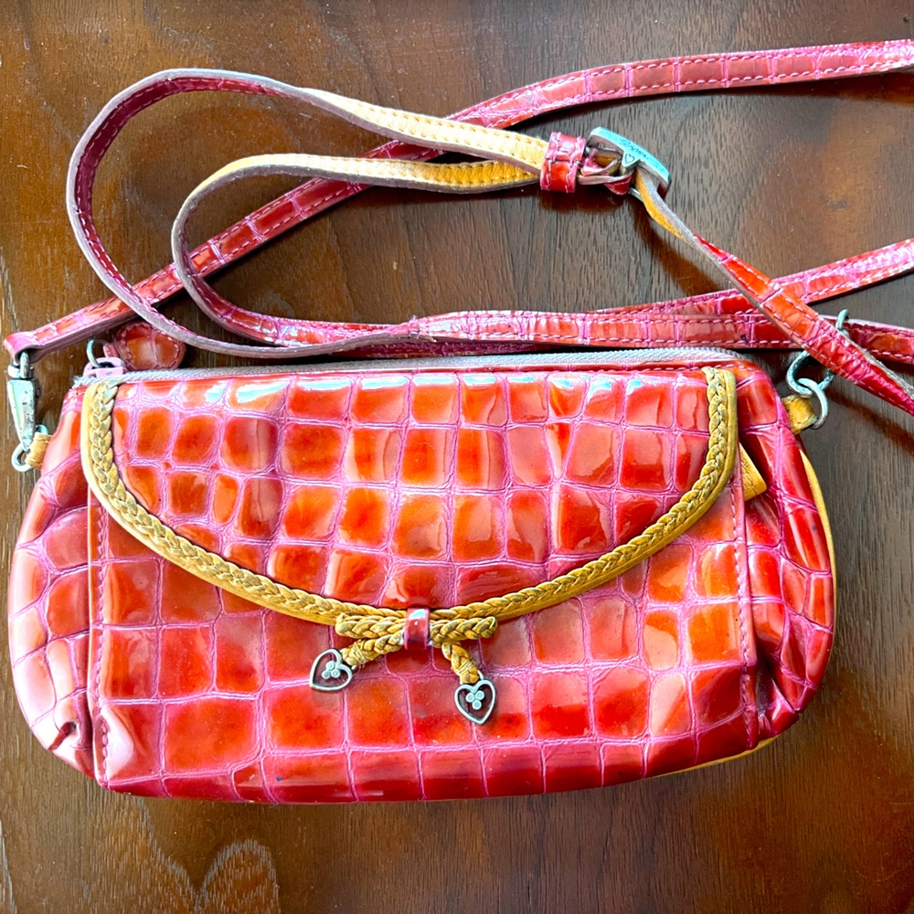 Used authentic Brighton clutch. Shoulder stray is removable